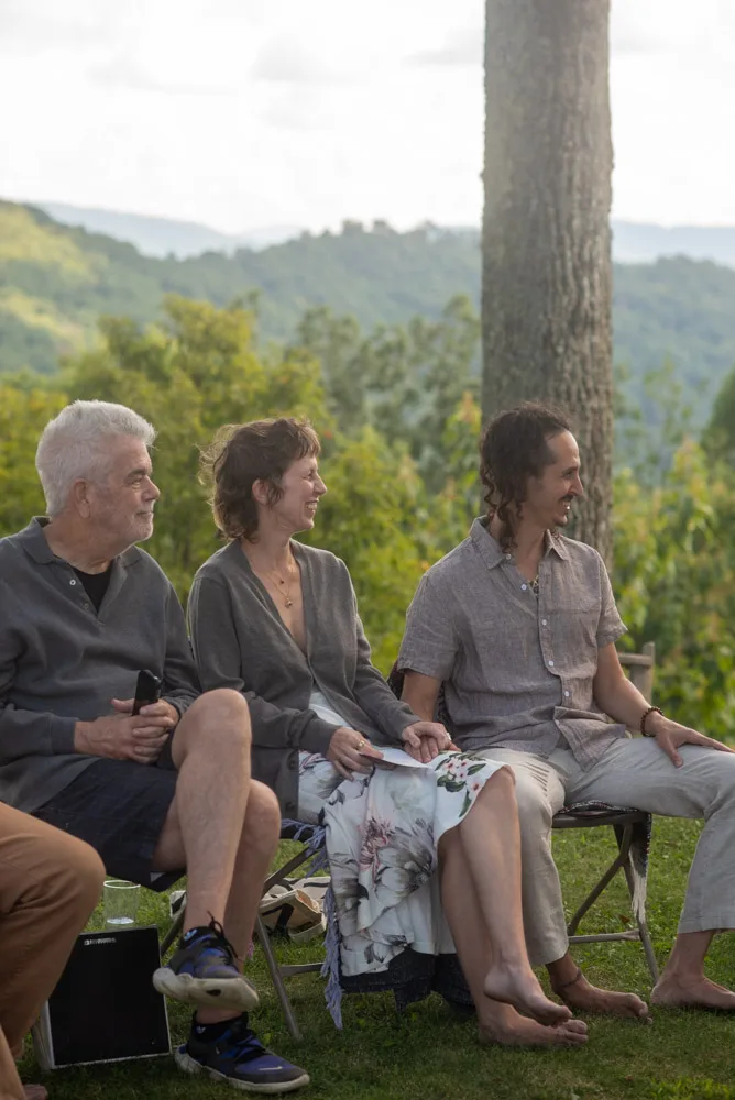 Guests laughing together during an outdoor celebration on a Blue Ridge mountain overlook